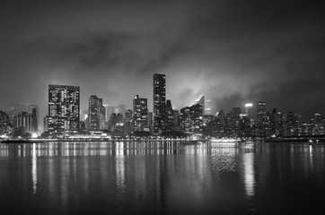 Fototapeta na wymiar Manhattan in smoke cloud after 4th of July fireworks, New York City, USA.