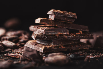 Dark chocolate chunks on table