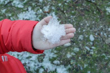 Snow ice on a child’s hand