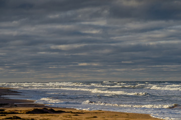 Rough seas along the shores of rural Prince Edward Island, Canada.