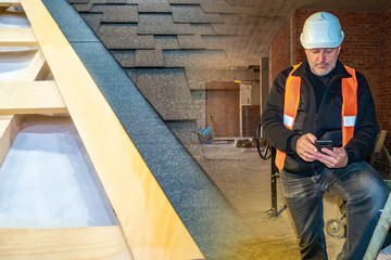 Builder on the background of a roof covered with soft tiles. Best building materials. Proper arrangement of the roof. Construction of country houses. Your new cottage with a soft roof.