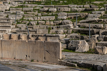 Picturesque view of Greek ruins of Theatre of Dionysos Eleuthereus - stone Roman Theater at the Acropolis hill. Theater dedicated to Dionysus, the god of plays and wine. Athens, Greece.