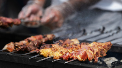 Pork skewers on the grill in the fresh air