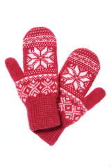 Warm woolen knitted mittens isolated on white background. Red knitted mittens with pattern