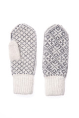 Warm woolen knitted mittens isolated on white background. Gray knitted mittens with pattern