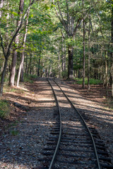 Obraz premium Railroads and roadways make there way through Broken Bow, Oklahoma.
