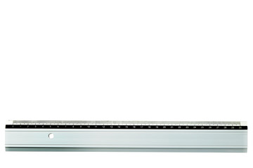 ruler laying straight at bottom of a white page