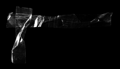 Transparent adhesive tape isolated on black background, with clipping path