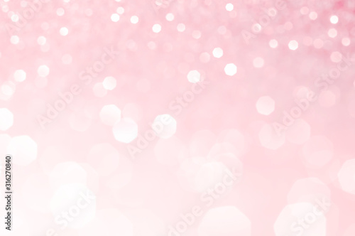 Light pink bokeh,circle abstract light background,Pink shining lights, sparkling glittering Valentines day,women day or event lights romantic backdrop.Blurred abstract holiday background.