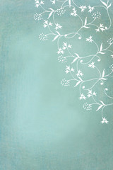 white flower painted on textured background  - copy space for your text