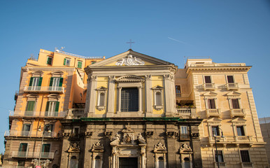 Fototapeta na wymiar Piazza Trieste e Trento boasts a scenic fountain and San Ferdinando church