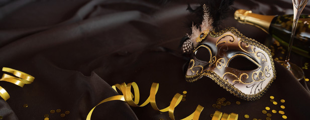 Carnival mask on black velvet background