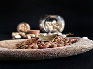 Variety of legumes on black background 