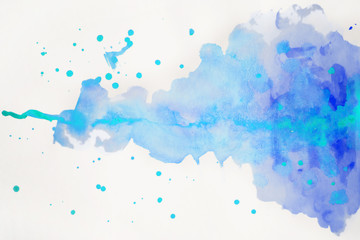 Abstract watercolor blot with splashes on a white background. Figure paints in blue-violet colors. Big stain on paper. Texture for design