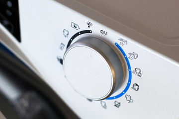 on off switch of a clothes dryer machine in an off position 