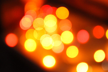 Defocused abstract multicolored bokeh lights background. Red, yellow,  orange colors.