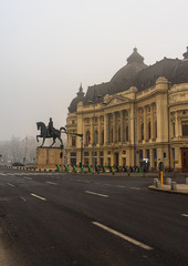 Detail view of the building of the Central University Library with equestrian monument to King Karol I in Bucharest, Romania, 2020 - obrazy, fototapety, plakaty