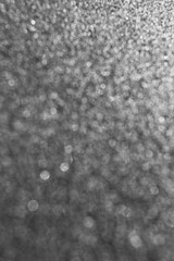 Gray classic texture for the designer background. Rough illuminated surface. Artistically textured...