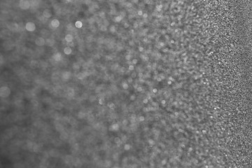 Gray classic texture for the designer background. Rough illuminated surface. Artistically textured...
