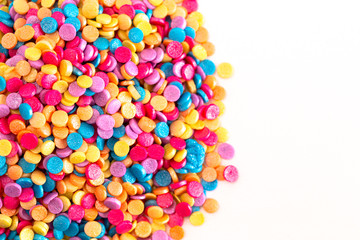 Fototapeta na wymiar Glittery Rainbow Sprinkles for Decorating your Baked Goods