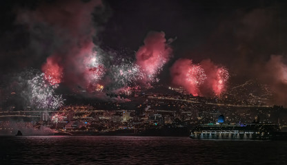 Fireworks show on New Year's Eve night in Funschal Madeira - obrazy, fototapety, plakaty