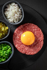 Raw beef tartare with fresh and healthy ingredients