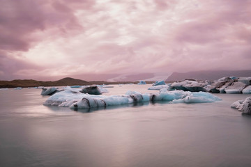Jokulsarlon glacier lagoon in Iceland. Long exposure shot makes the water and the sky silky. Long exposure, glacier, moody concepts