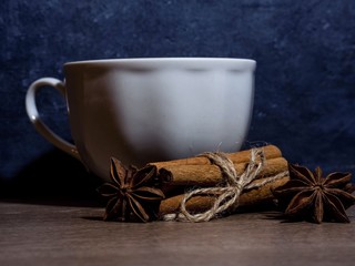 cup of coffee with cinnamon and anise