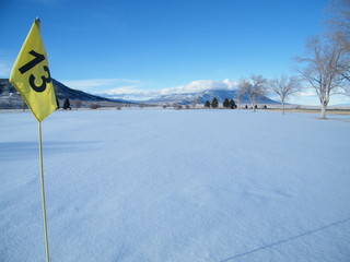 Mountain Golf Course 13th Hole Flag in Winter Snow