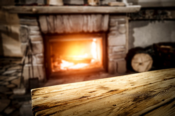 Desk of free space and home interior with fireplace 