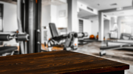 Desk of free space and gym interior 