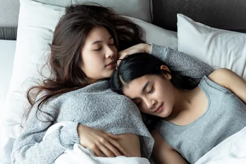 Two asian friendship women in room,like lovely lesbian couple. © montira