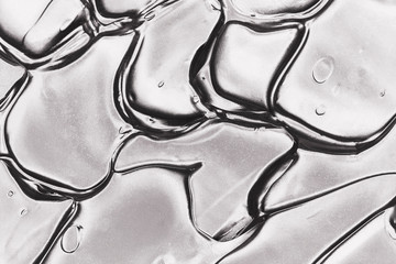 liquid metallic silver shiny acrylic paint stroke smudge melted metal texture glossy cosmetic industrial smudge art paint 
