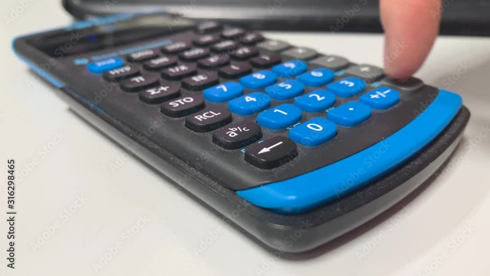 Aufkleber type numbers into a calculator to make a calculation