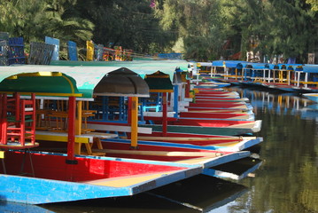 Fototapeta na wymiar Trajinera boats in Xochimilco Lake, Mexico City