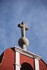 cross on top of church in mexico city