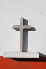 cross on a white and red background