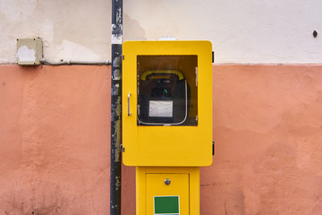Italian defibrillator on a street in a historic city center