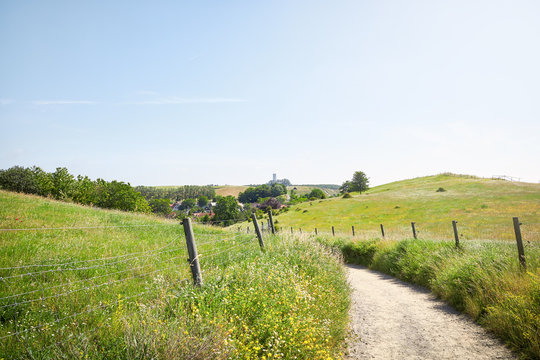 Walkway through green nature in village of Kaseberga in south Sweden.