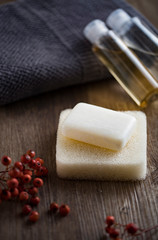 Organic soap and towel on table. Aromatherapy organic concept.