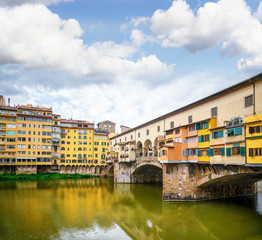 Fototapeta na wymiar Colorful Florence buildings on the water canal