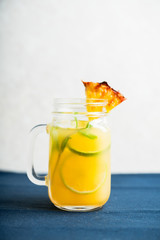 Pineapple mojito cocktail in jar. Selective focus. Shallow depth of field.
