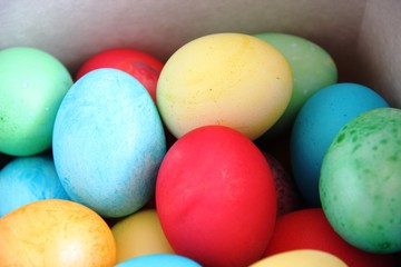 lots of multicolored Easter eggs. Easter painted eggs. red, yellow, blue and green eggs
