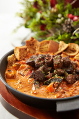 Beef steak with tomato sauce and bread 