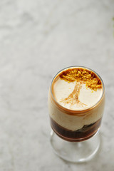 Coffee dessert, tree design on cream 