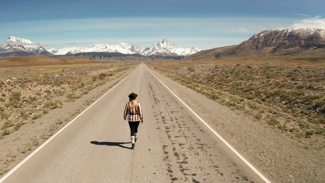 Back View of Girl Waking toward the Los Glaciers National Park at El Chalten near Santa Cruz, Patagonia, Argentina.
Explorer Enjoying the Panorama in the Wilderness of the Steppe.