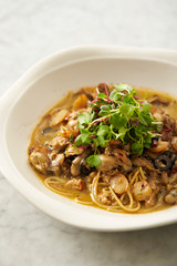 Oyster and garlic spaghetti studio shot 