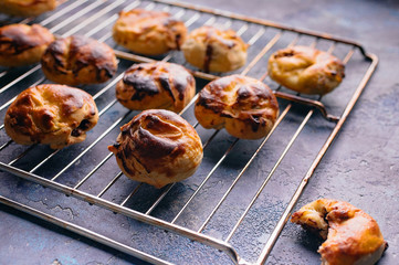 Homemade sweet buns with salted caramel and nuts.