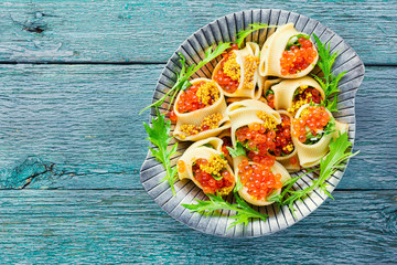 Red caviar filled pasta