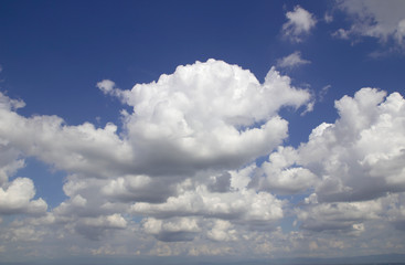 Fototapeta na wymiar blue sky with clouds background, texture.
